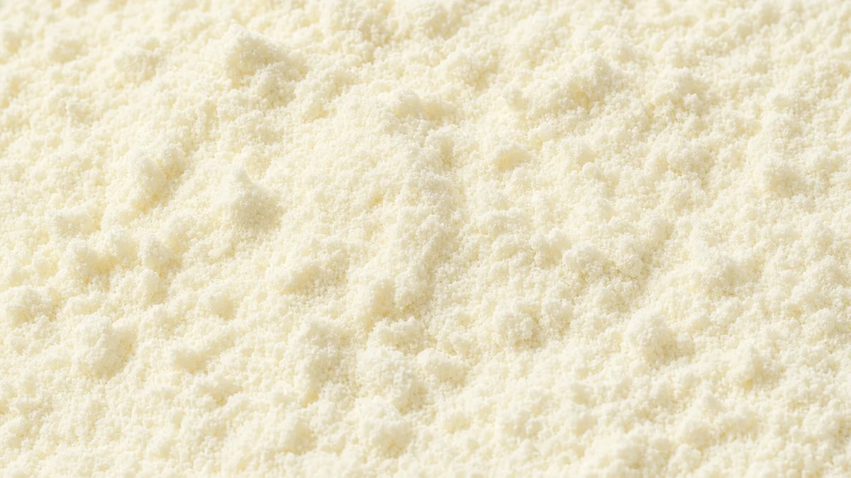 Calcium pantothenate, a soft creamy off-white powder